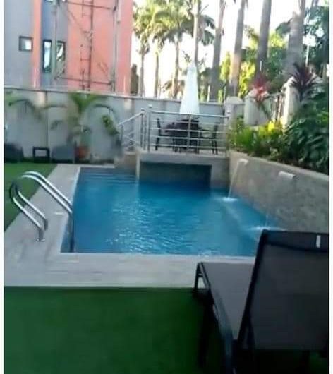 A brand new & fully furnished 3 bedroom luxurious apartment with 2 living rooms, a private garden, and an ante room It has a boys quarters at the back.